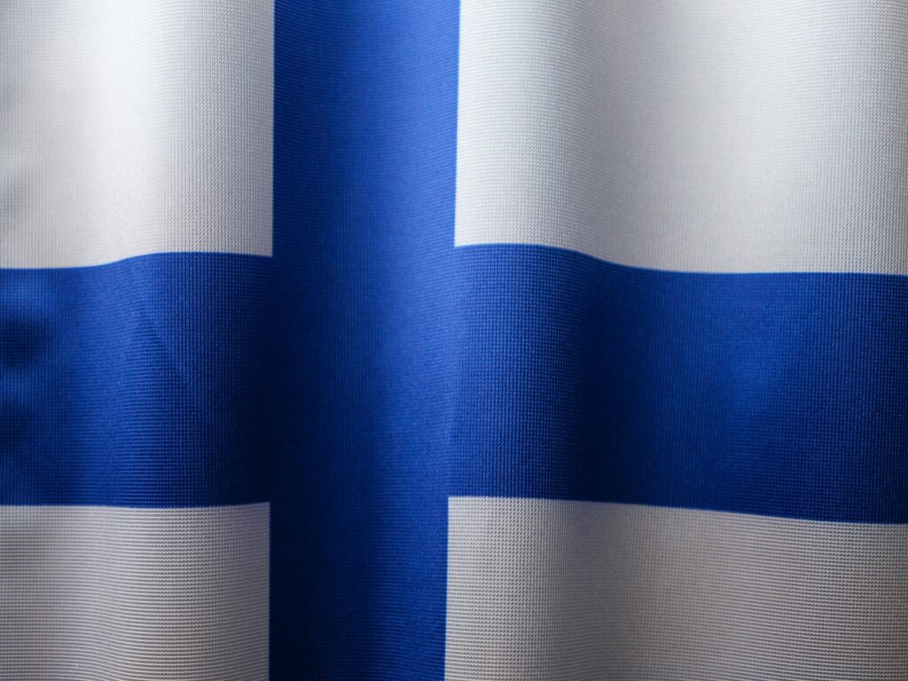 a close up of a blue and white curtain
